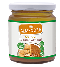 Un tarro de 225 g de Crema de Almendra Ecológica Tostada de deliCatalia (Jijona S.A.), etiquetada como ecológica, sin gluten, con imágenes de almendra tostada y etiquetado ecológico.