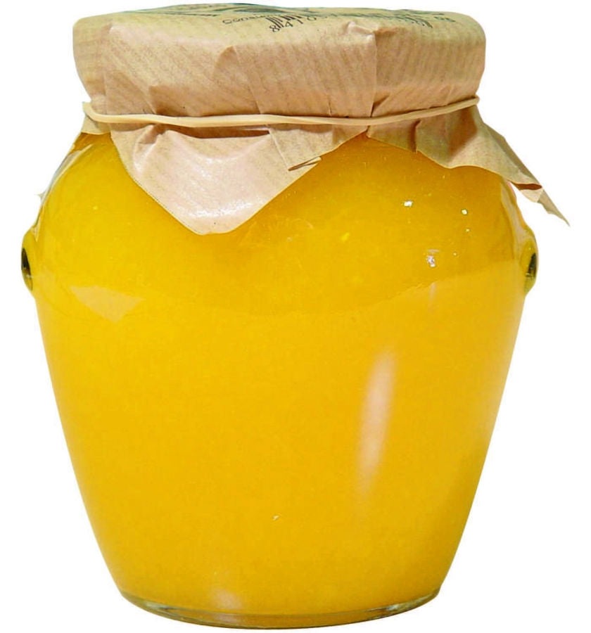 Un tarro de cristal de 350 g de Mermelada de Piña de Jijona S.A., sellado con una tapa de papel marrón y cordel, ofrece mermelada de piña de color amarillo brillante con propiedades desintoxicantes y beneficios antioxidantes naturales.