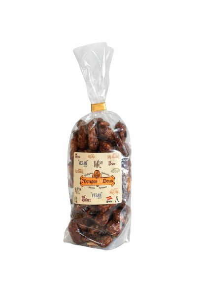 Una bolsa de plástico transparente con la etiqueta "Almendras Garrapiñadas 1kg" de Menges de Deus - Alicante - Cerdá, 104. 03009 Alicante, con un lazo giratorio en la parte superior, contiene bocadillos veganos y sin gluten de Almendra Largueta.