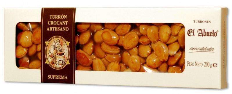 Una caja de 200 g de Turrón Crocant Artesano El Abuelo de Jijona S.A. presenta una ventana transparente que revela el turrón de almendras y frutos secos, además de información nutricional detallada en el envase.
