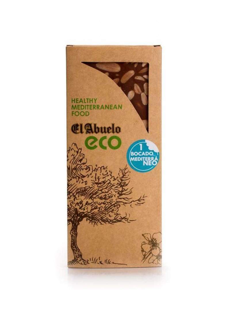 Un Turrón de Almendra El Abuelo de Jijona S.A., en un envase de cartón de 200 g con un dibujo de un árbol y una ventana que muestra las semillas: un delicioso capricho mediterráneo respetuoso con el medio ambiente.