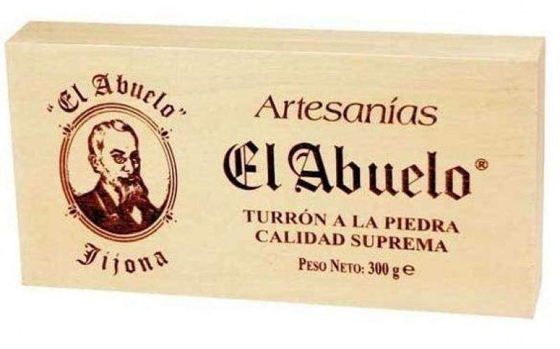 Turrón a la Piedra Artesano El Abuelo - caja de madera 300 g, de Jijona S.A., Partida de Alequa s/n, Jijona, Alicante; incluye detalles en español y destaca almendra marcona seleccionada.